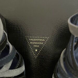 Brand new. Only worn once. Clean. Runway designer. Valentina Rangoni. Wedge heel